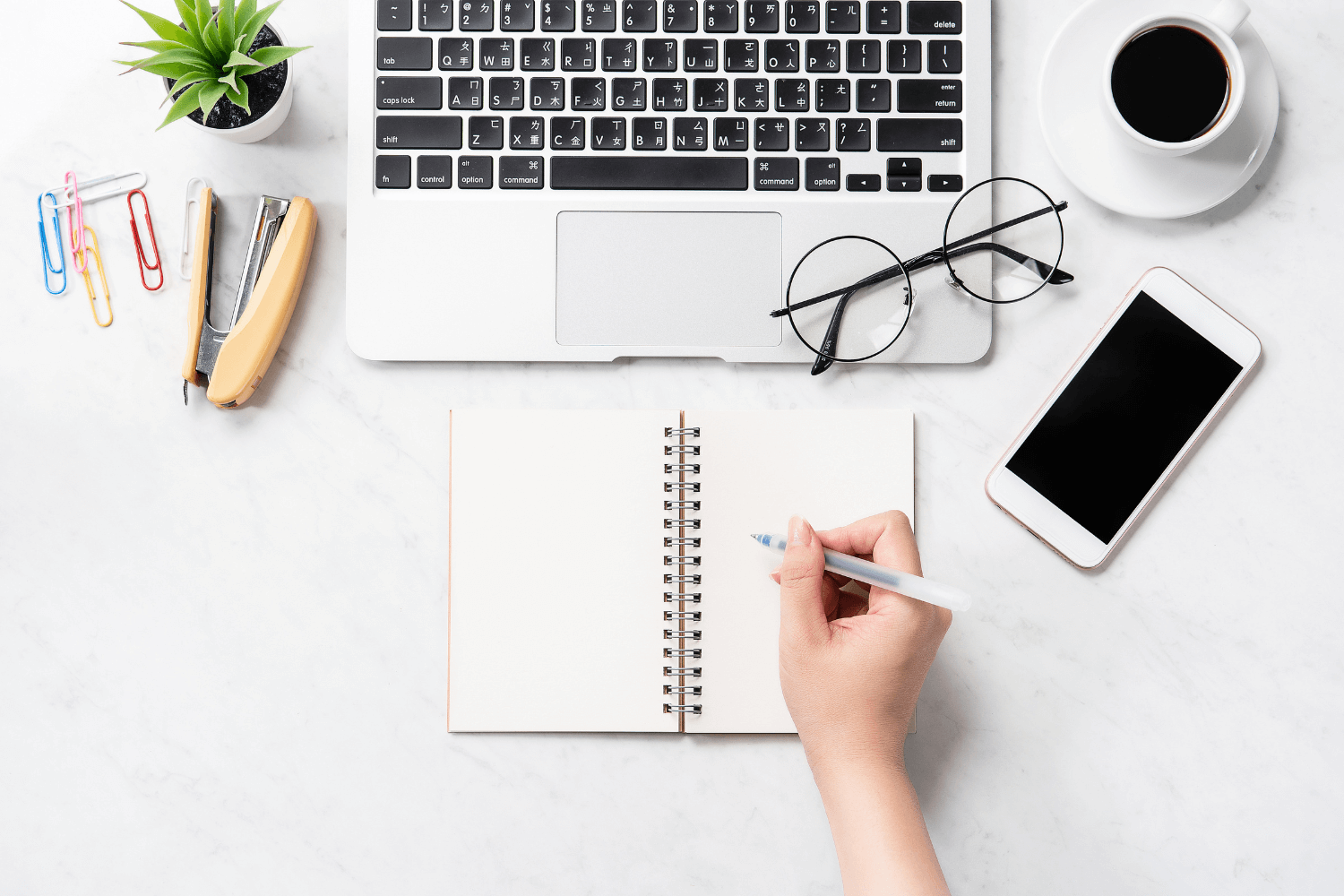 Notebook with marketing audit notes on a clean desk