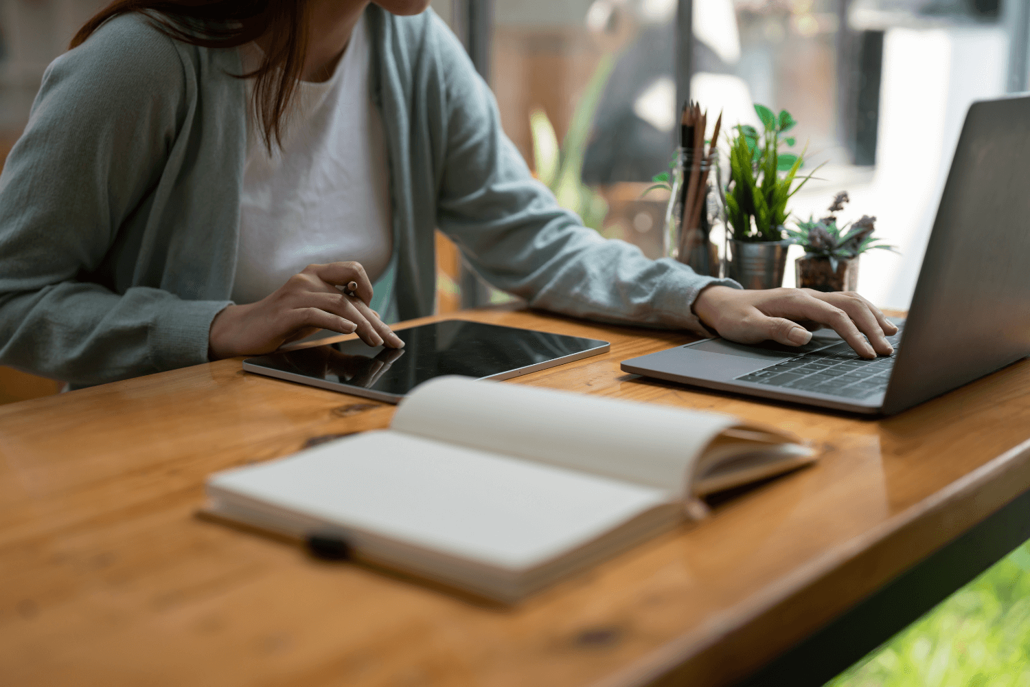 Flat lay of laptop and SEO strategy notes on desk – small business digital planning