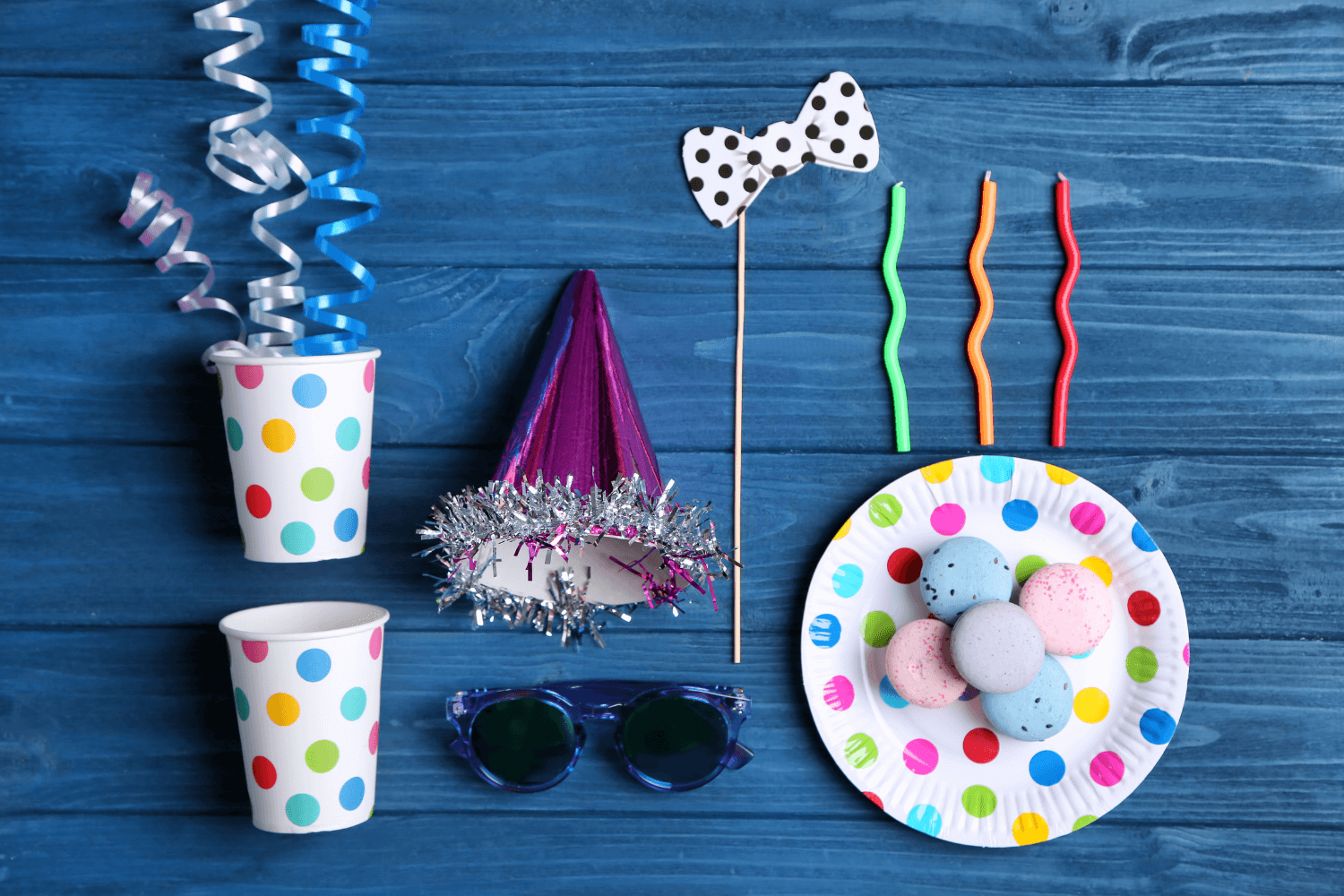 Flat lay of colourful custom party accessories