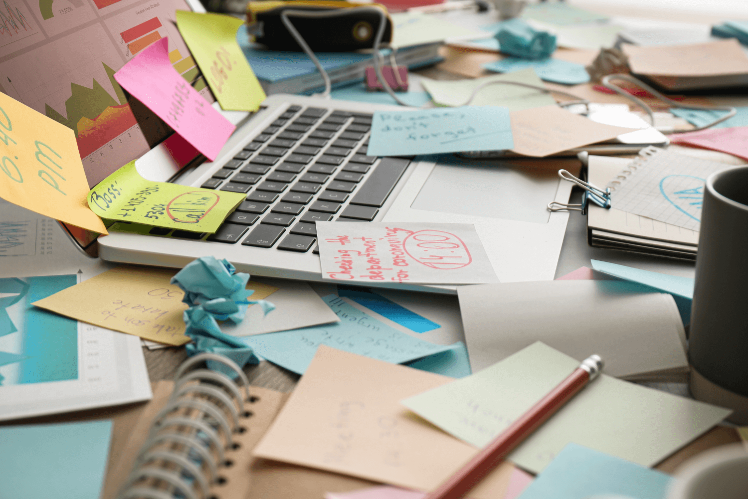 Overwhelmed founder surrounded by disorganised marketing notes