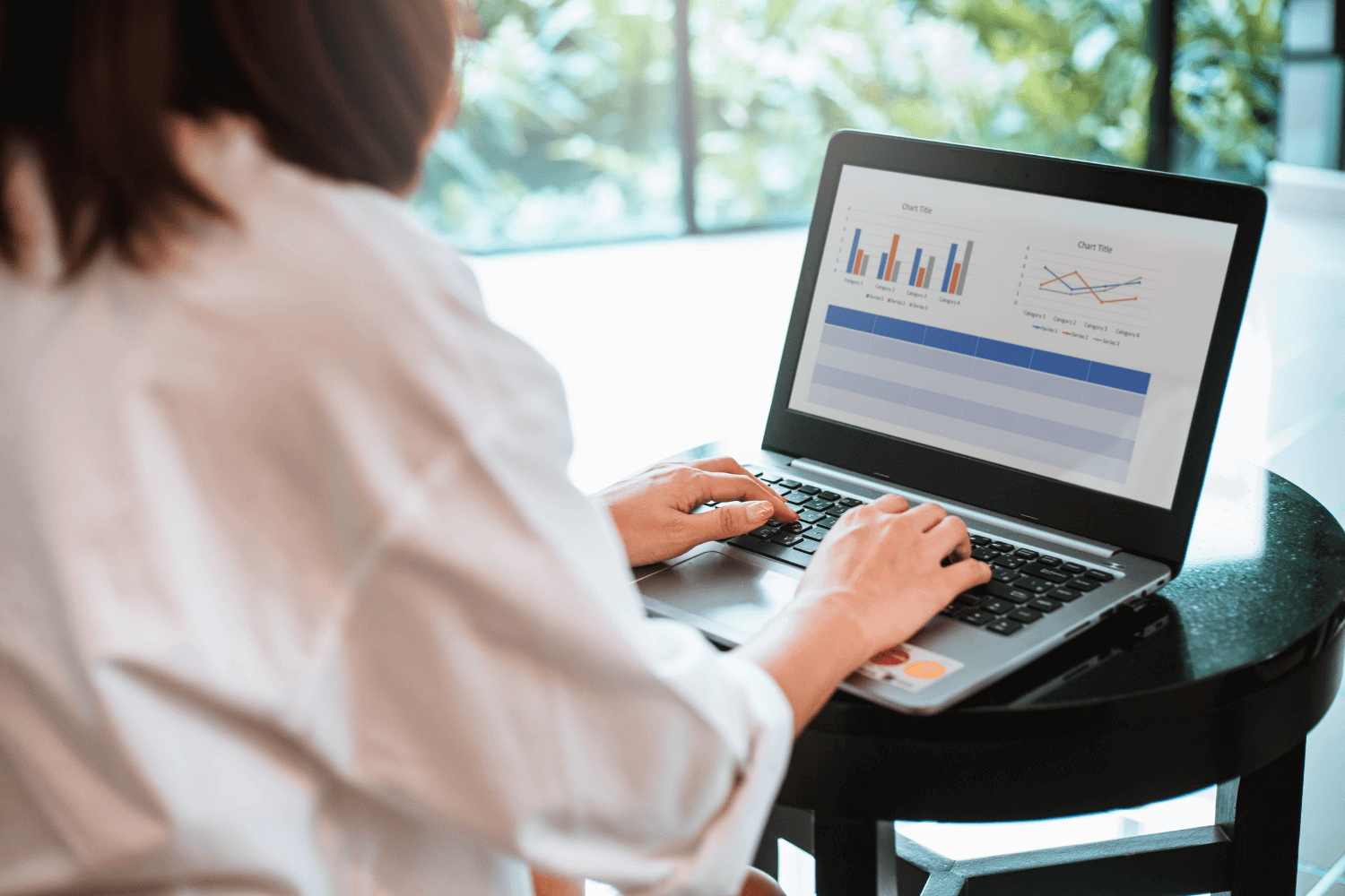 Small business owner analysing social media content strategy